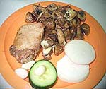 Schweinenackenbraten mit Champignons